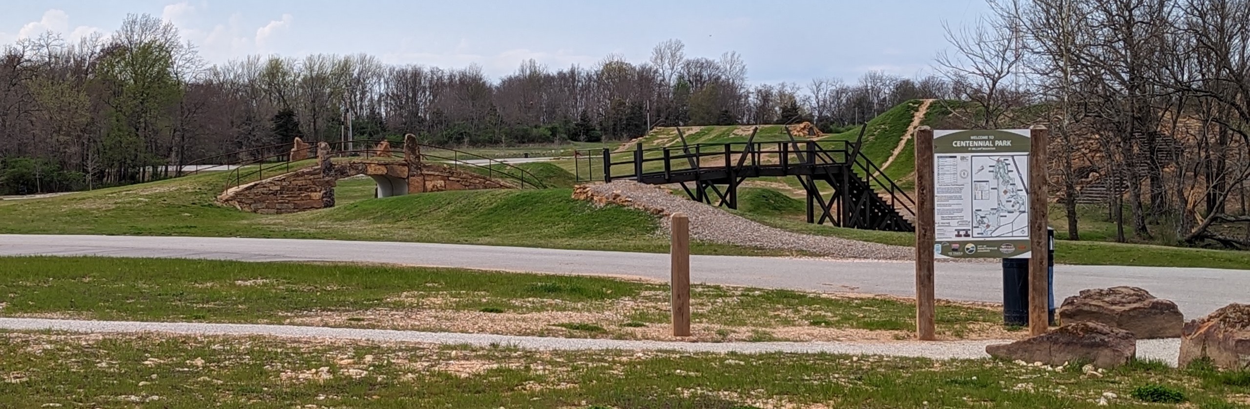 The parks sign sits in the foreground with the many off-road courses in the background.